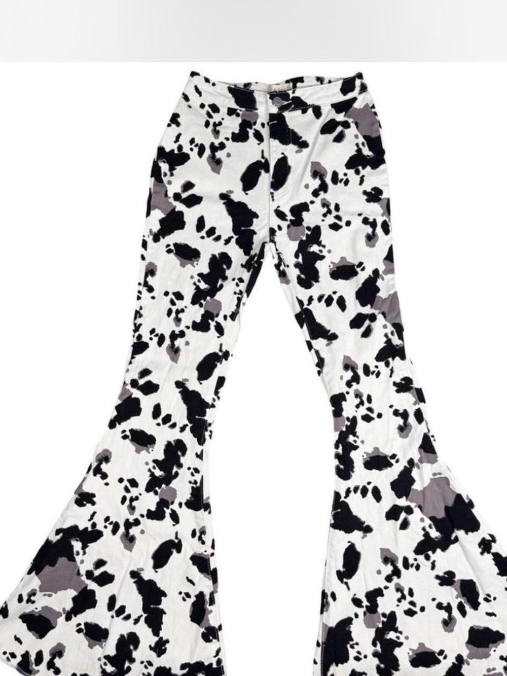 Altar'd State white/black cow print denim bell bottoms  in a S‎